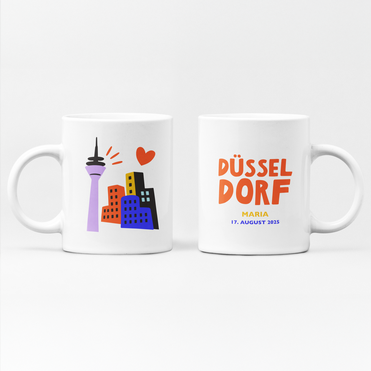 Personalisierte Tasse mit Düsseldorf-Motiv und Name/Daten.