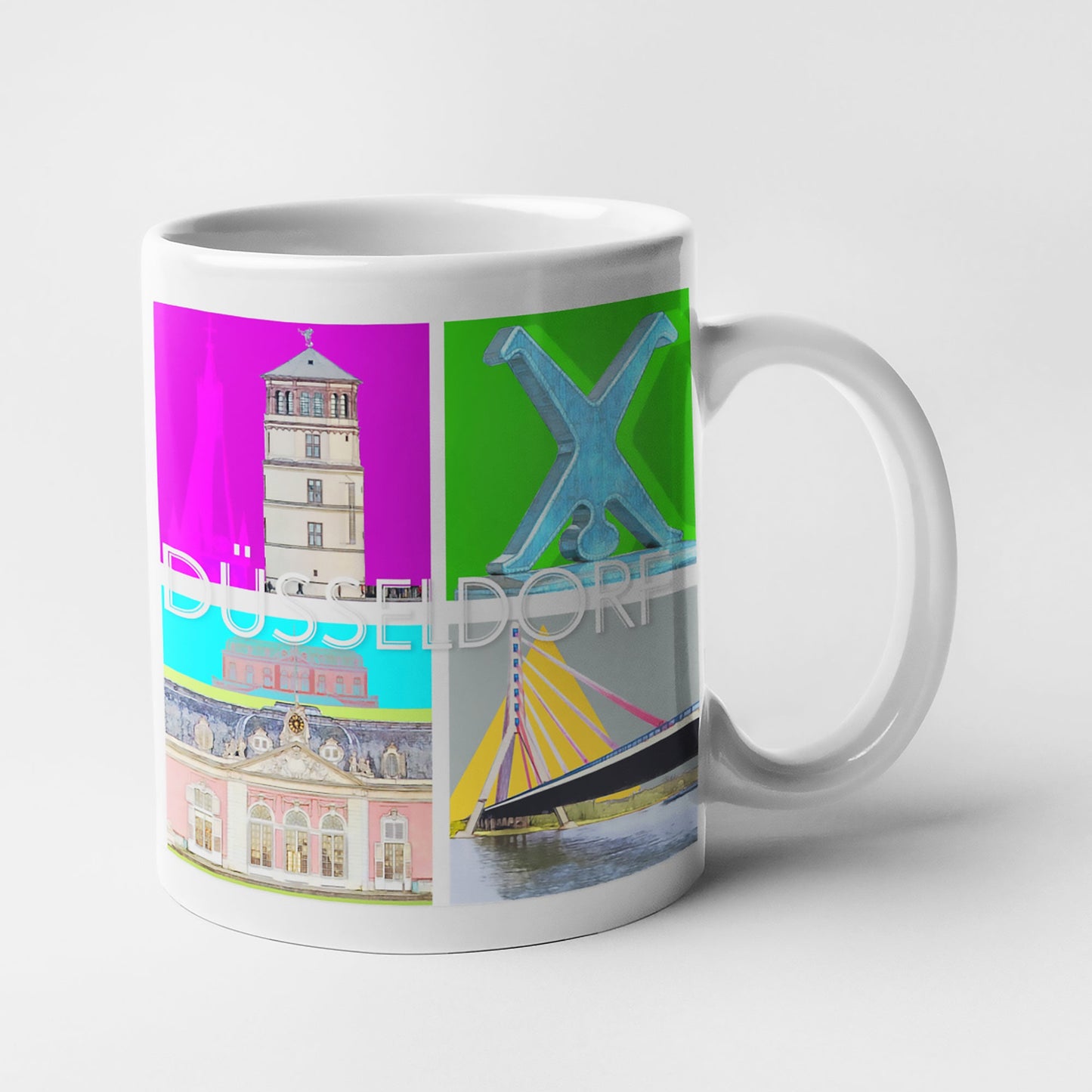 Kaffeetasse mit künstlerischer Düsseldorf-Collage von Bernd Röttgers, ideal als Geschenk oder Souvenir.
