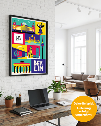 Personalisierte Geschenke für Geschäftspartner: Farbgewaltige Berlin Illustration mit individuellem Unternehmenslogo als gerahmte Wandkunst in einem hellen Büro über einem Schreibtisch mit Laptop.