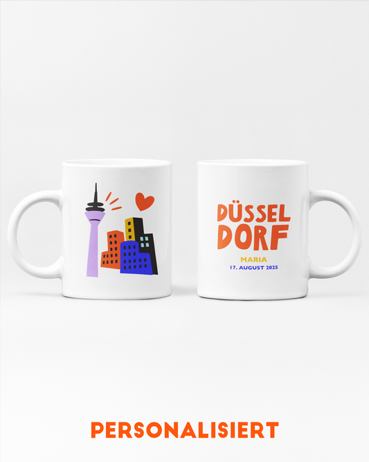 Personalisierte Tasse mit Düsseldorf-Motiv und Name/Daten.