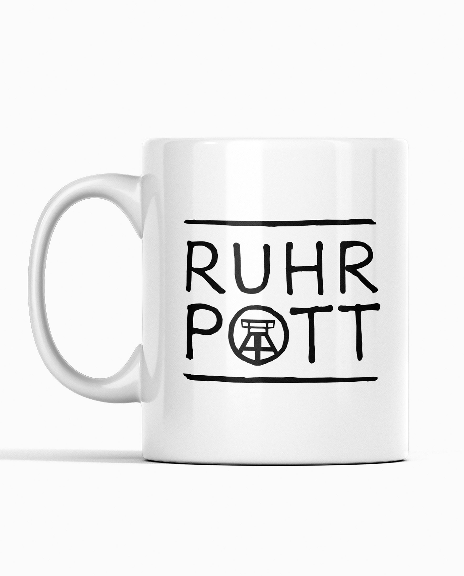 Weiße Keramiktasse mit schwarzem 'Ruhrpott'-Schriftzug und Zechen-Motiv, beidseitig bedruckt.
