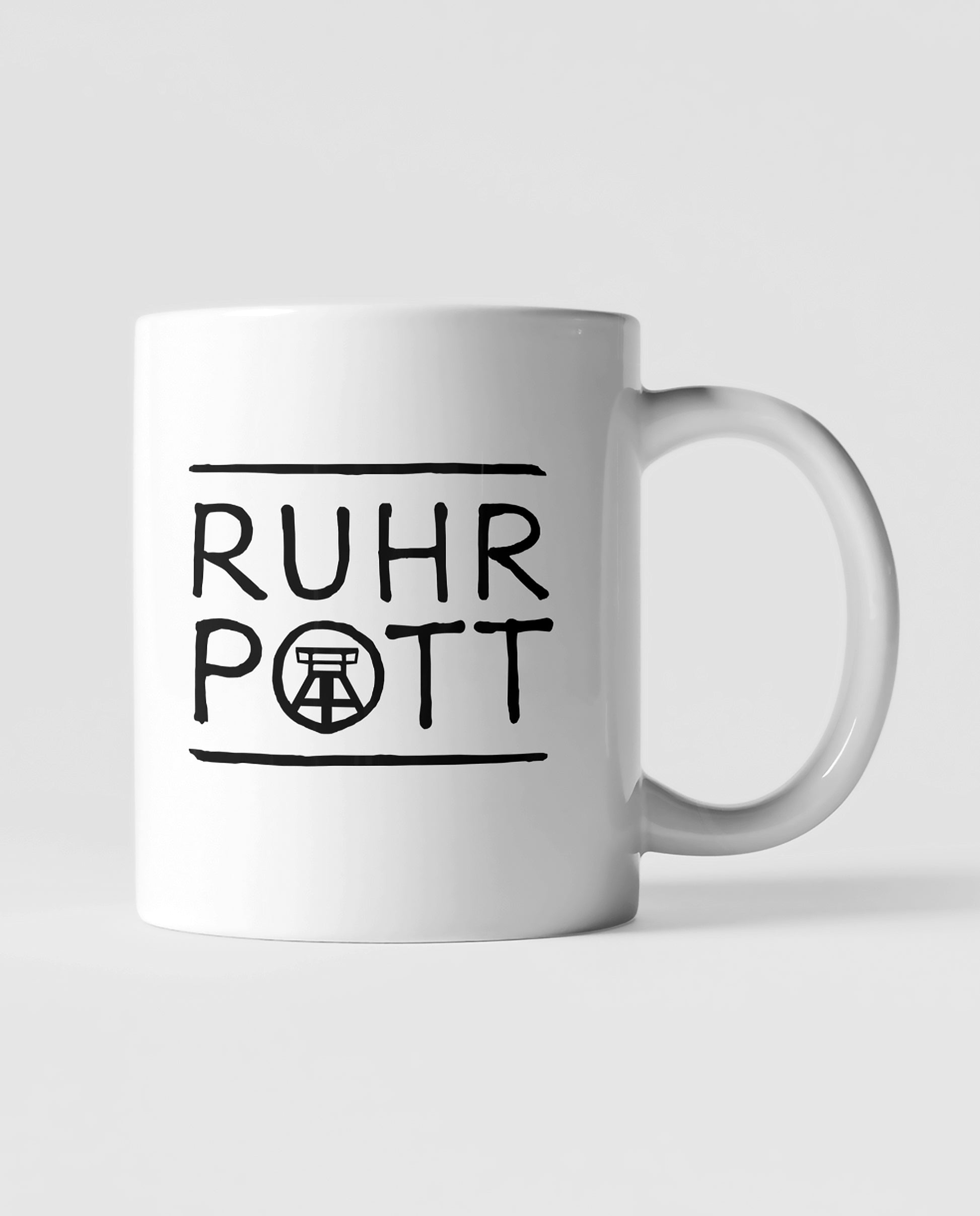 Minimalistische Ruhrpott-Tasse mit handgezeichnetem Design, perfekt für Kaffee- und Teeliebhaber.