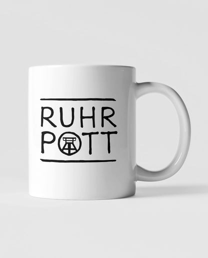Minimalistische Ruhrpott-Tasse mit handgezeichnetem Design, perfekt für Kaffee- und Teeliebhaber.